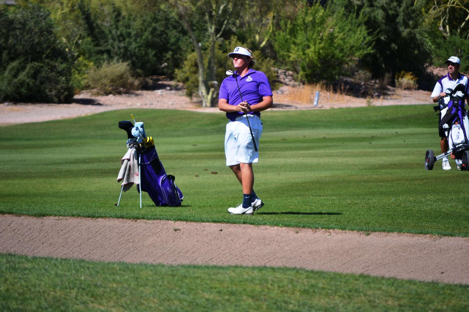 Students playing golf