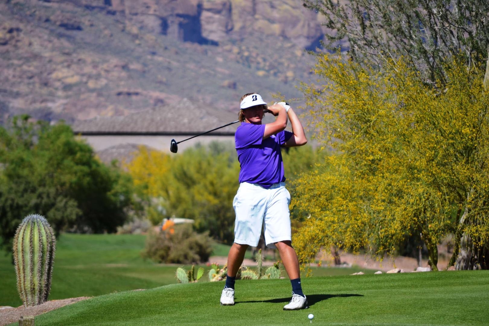 Students playing golf