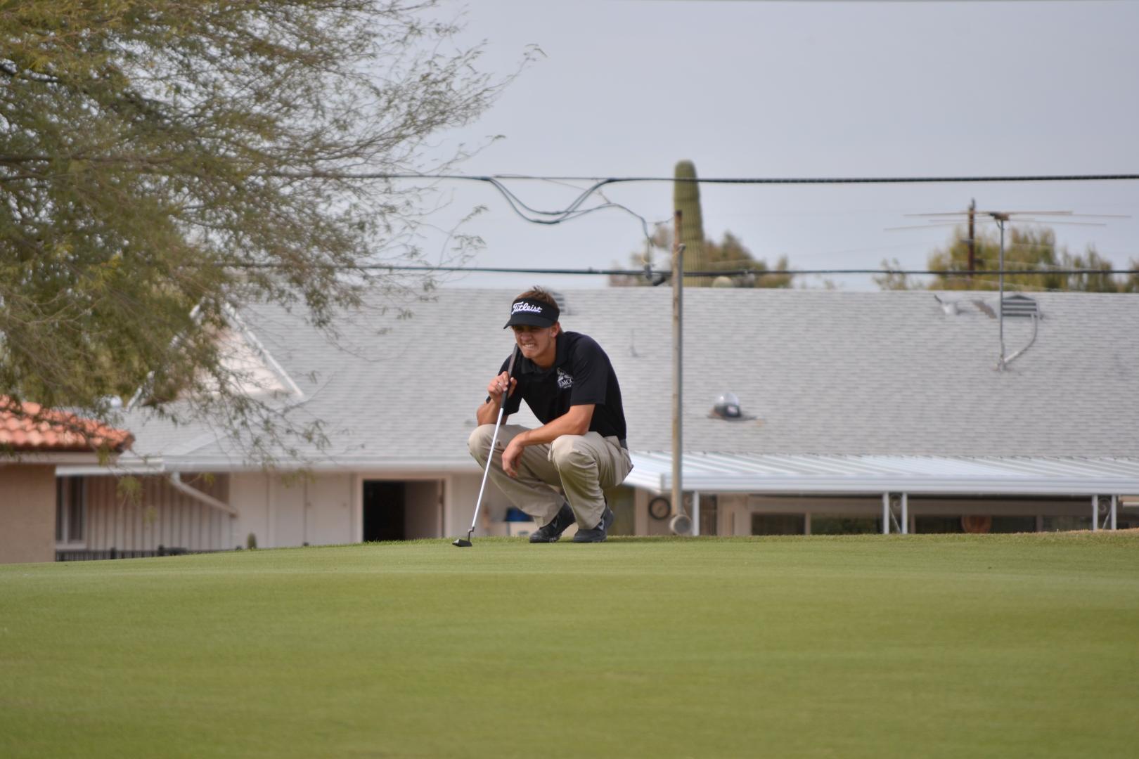 Students playing golf