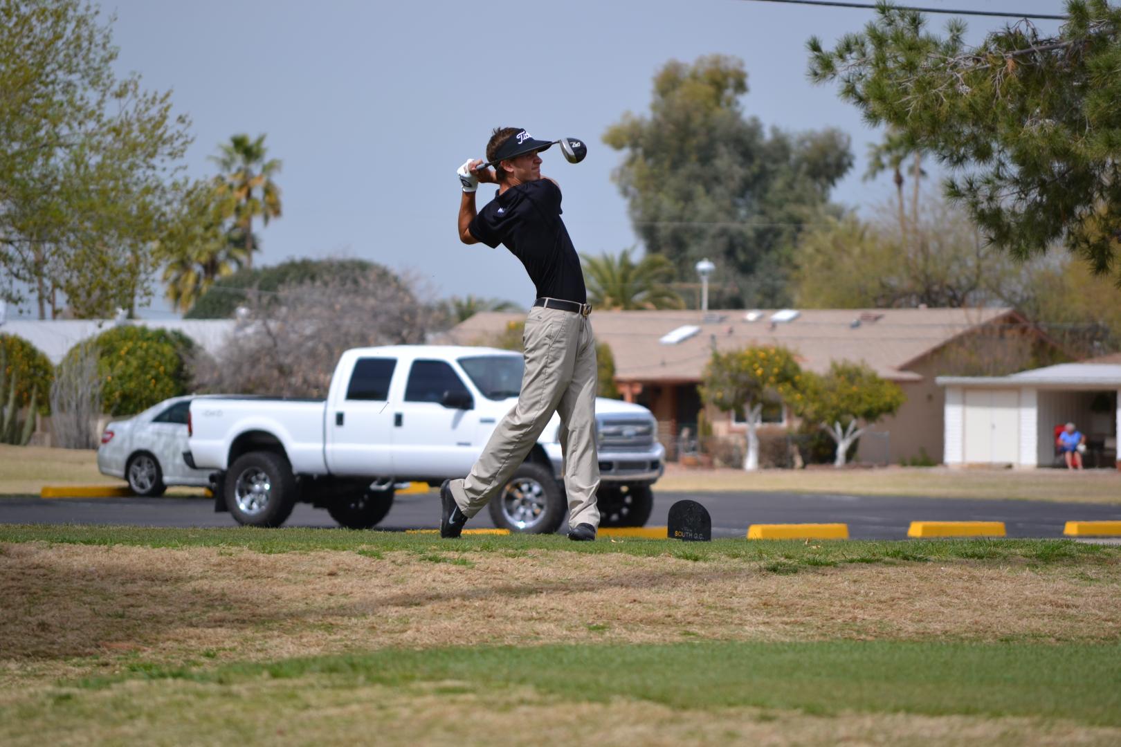 Students playing golf