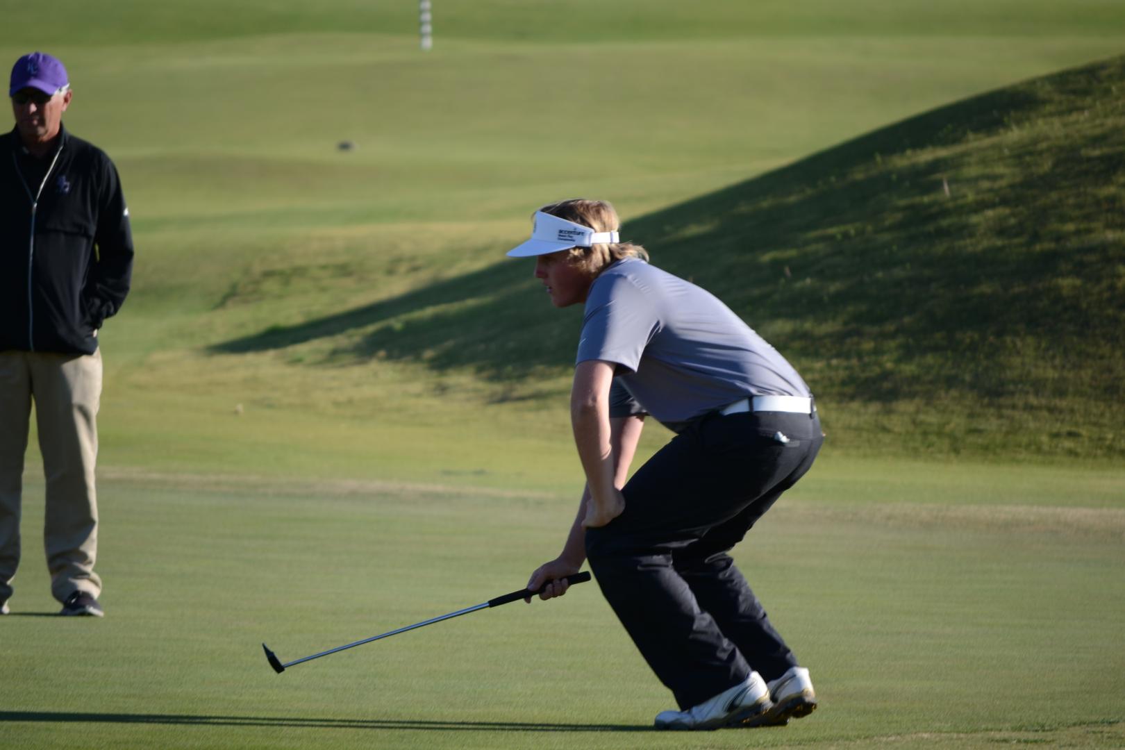 Students playing golf