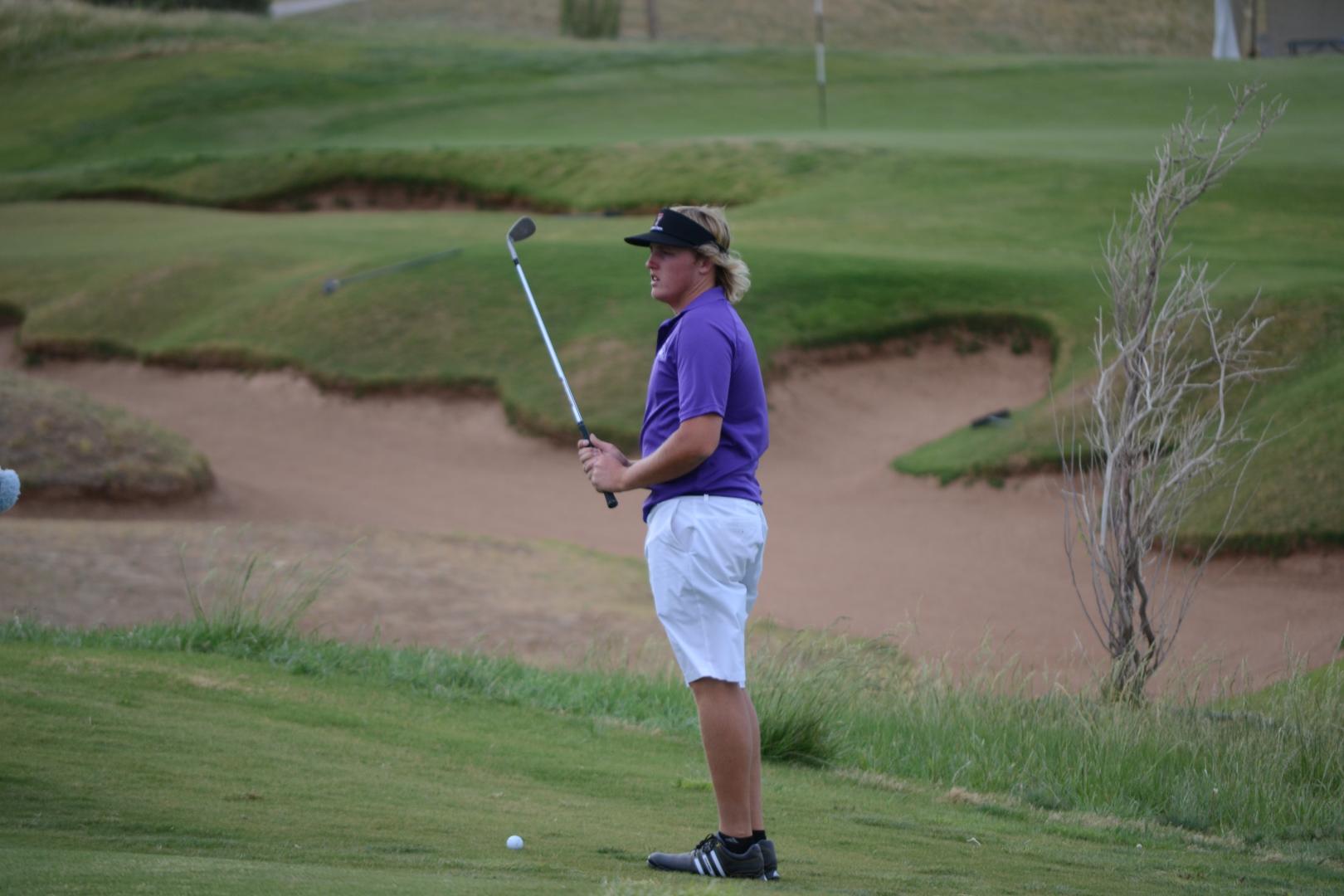 Students playing golf