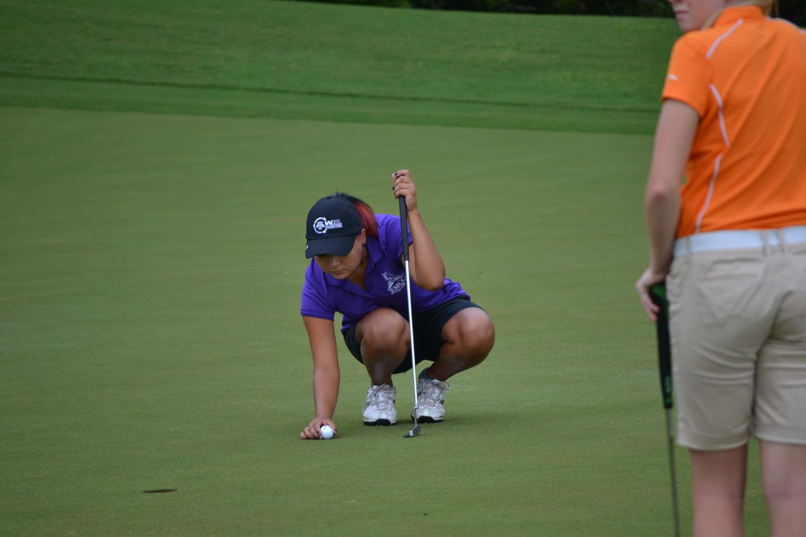 Students playing golf
