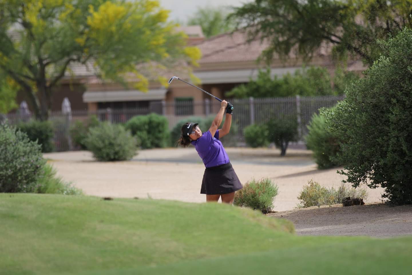 Students playing golf