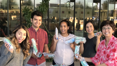 Nichole Grabowski with her student club members making hygiene kits.