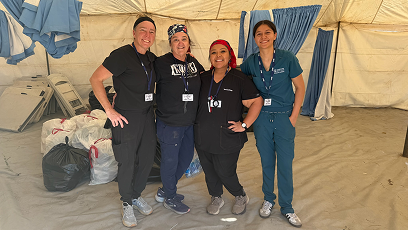 Amy Johnson, Ren Blake, Victoria De La Paz,  and Alysha Hall in their nursing scrubs.