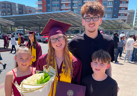 Madalynn Eidson on graduation day with her siblings.