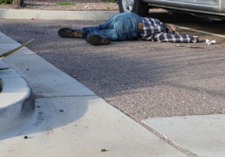 A dummy portraying a dead body.