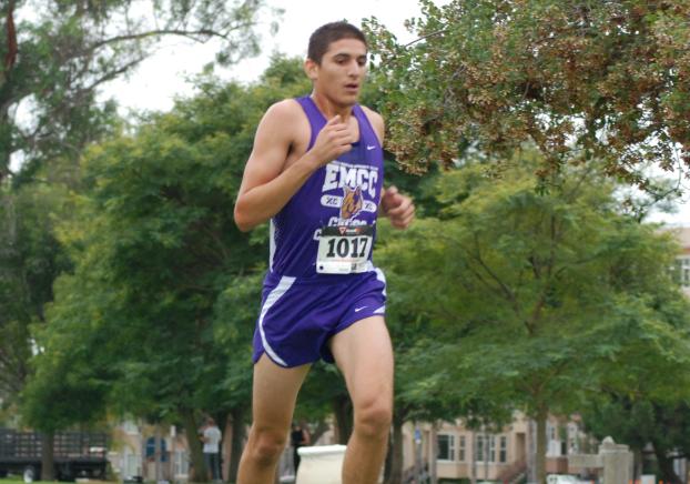 A man running in a park.